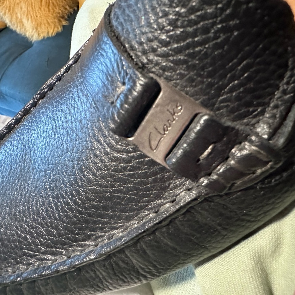 Men’s black Clarks driving loafers. Size 12. New, retails for $190. Now $150.